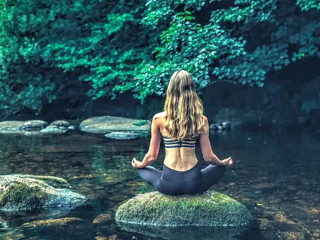 Girl in meditation pose